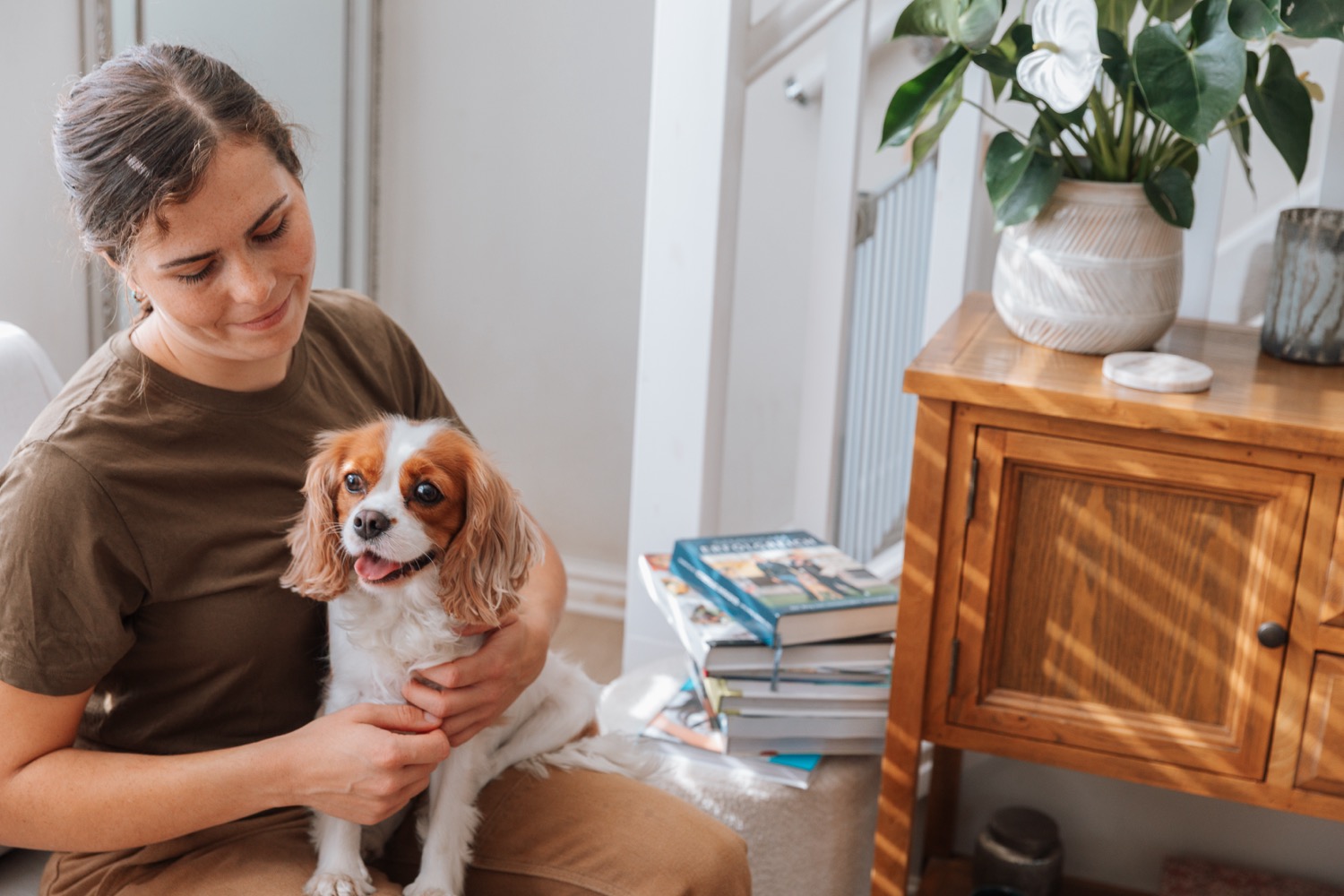 Flurina with a dog in the Residential Training home environment